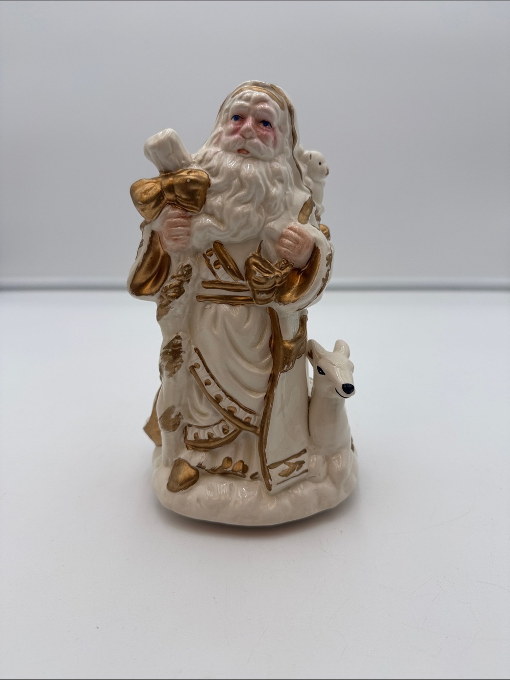 World Bazaar Ceramic Santa with a Fawn and Bear Music Box Christmas Decoration